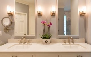 bathroom vanity with two sinks and two mirrors