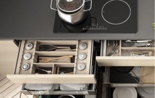 open kitchen drawers under a built-in convection stovetop