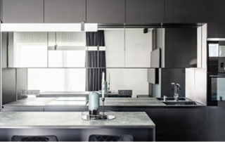 Sleek, modern kitchen cabinets with a mirrored finish