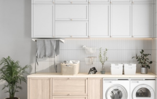 laundry room cabinets over modern front-loading washer and dryer