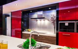 kitchen with shiny, red cabinet fronts