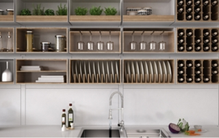 organized dishes in open shelving in a small kitchen